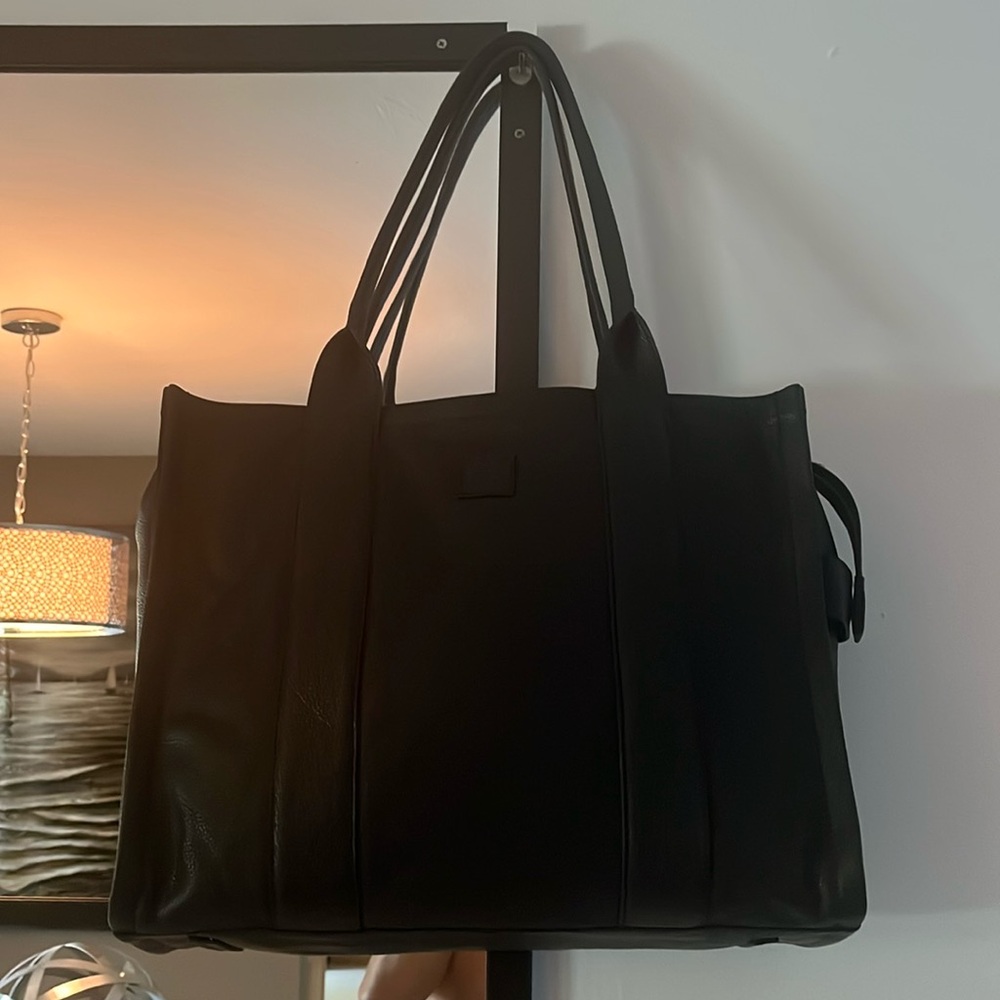 Never worn black leather tote bag. Sample from a developing brand.